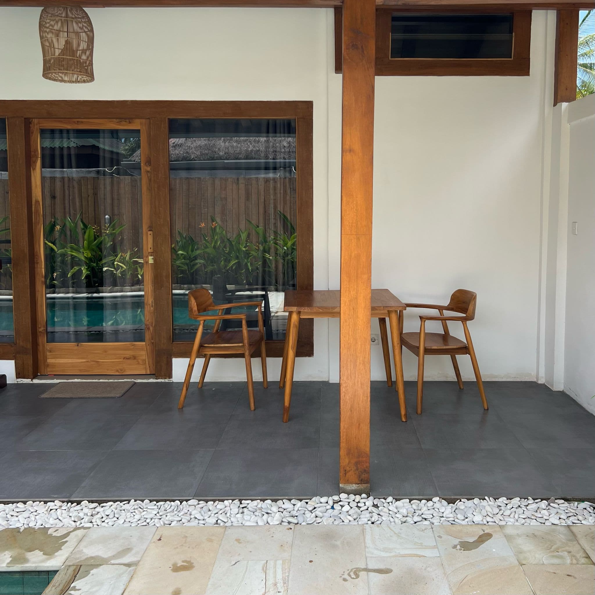 Private terrace with teak table and chairs